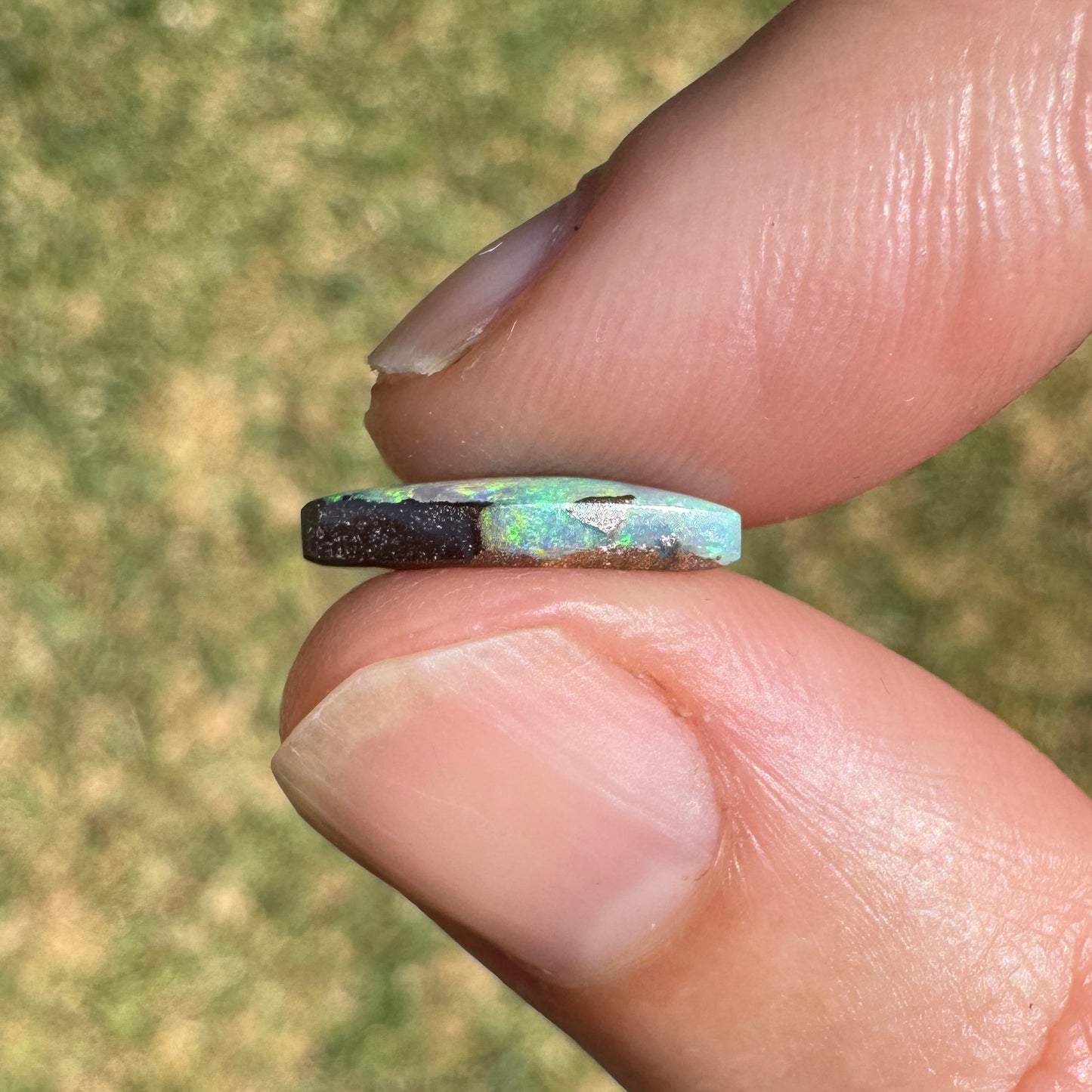 1.69 Ct small diamond shaped boulder opal