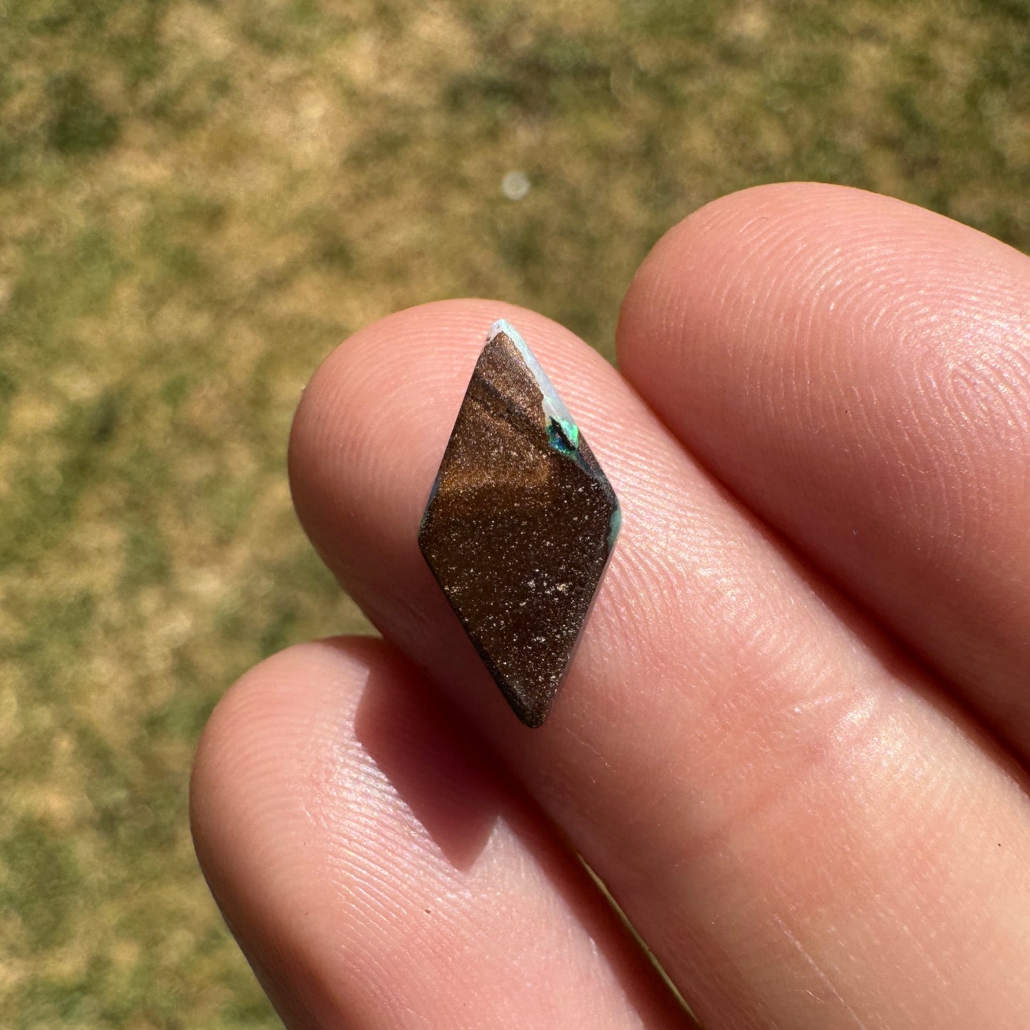 1.69 Ct small diamond shaped boulder opal